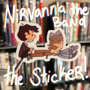Op de afbeelding: Een sticker met cartoon illustraties van twee muzikanten. De tekst "NirVanna the Band" staat boven de illustraties en "the Sticker!" eronder. De sticker heeft een witte rand en staat tegen een vage achtergrond van boeken.