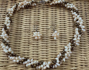 Three-strand freshwater pearl necklace and matching earrings - brown and white - 18 inch length.