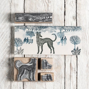 Tampon chien lévrier avec scène de paysage hivernal