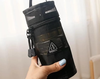 2025 new high-end women’s makeup bag, portable and large-capacity, premium design, perfect for travel, black mesh cosmetic storage bag.