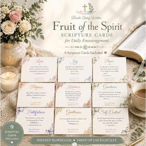 May include: A set of nine rectangular scripture cards titled Fruit of the Spirit, featuring floral borders and daily encouragement text. The cards display words like Love, Joy, and Peace, alongside a vase of roses, a candle, and an open book.