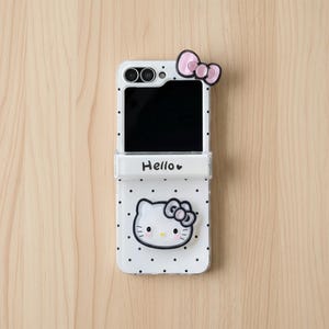 Cute Cartoon Sanrio Hello Kitty Wave Point Bow Phone Case for Samsung Galaxy Z Flip 7 6 5 4 3 – Soft TPU Cover with Lanyard