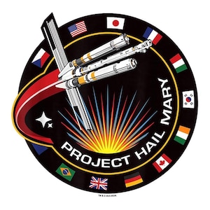 May include: A circular patch with a black background features a stylized spacecraft and the text "PROJECT HAIL MARY." The design includes flags of various nations and a burst of colorful rays, with the words "HAIL MARY" in white.