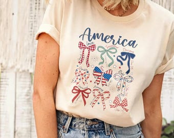 America Coquette Bow Tee, Patriotic Ribbon Collection with Bible Verses Print Cream Crew Neck Shirt，Christian Patriotic Bow Tee