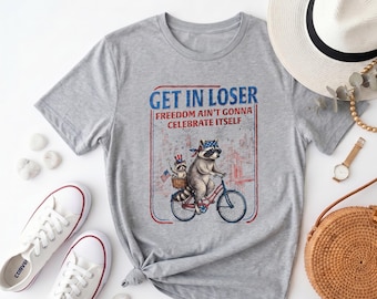 Funny Patriotic Raccoon Tee, "Get In Loser Freedom Ain't Gonna Celebrate Itself" Heather Gray Crew Neck Shirt，Funny Independence Day Tee