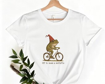 Off To Cause A Kerfuffle Frog Tee, Whimsical Frog On Bicycle With Wizard Hat Print White Crew Neck Shirt， Frog Bicycle Casual Tee