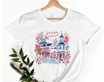 Patriotic Floral Town Tee, "God Bless America" Watercolor Street Scene Cream Crew Neck Shirt，God Bless America Watercolor Casual Tee