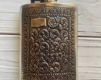 Sterling Silver Flask for Liquor from the 1910s with ornate floral design
