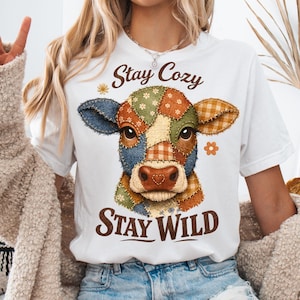 May include: A set of three ceramic mugs with a speckled, matte finish. The mugs are in shades of cream, light gray, and dark gray. Each mug has a simple, minimalist design, perfect for coffee or tea.