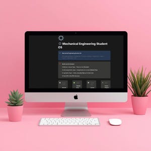 May include: A desktop computer with a black screen displaying "Mechanical Engineering Student OS" text. A keyboard, mouse, and two potted plants sit on a pink desk. The computer screen shows a list of tasks.