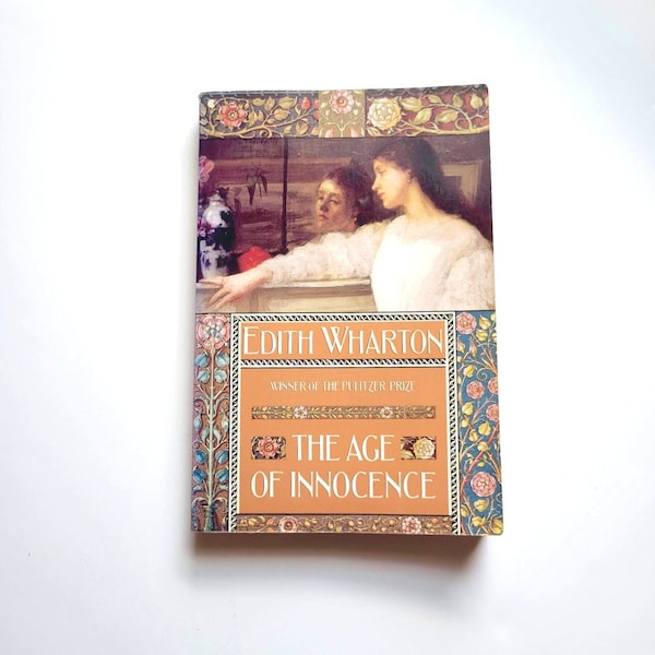 Vintage book, The Age of Innocence by Edith Wharton, Softcover edition by Collier Books, Copyright 1992