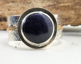 Pulsera de puño de piedra dorada azul de plata esterlina y latón