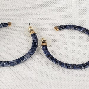 Blue leather wrapped hoop earrings