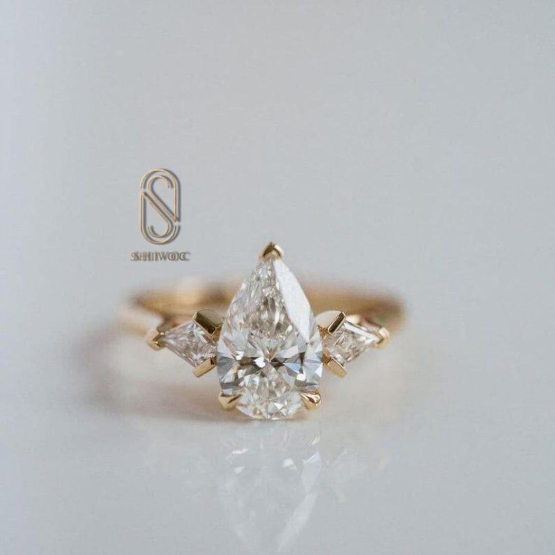 Pear Cut Moissanite Three Stone Ring, Kite Side Diamond Engagement Ring ...