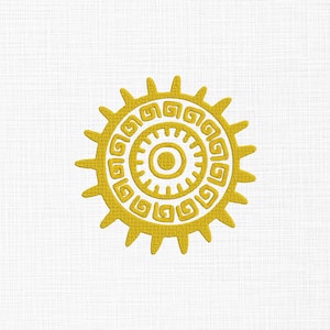 May include: A golden yellow sun design with a central circle and radiating points. The sun's interior features a repeating spiral pattern. The design is set against a white textured background.
