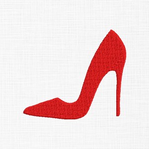 May include: A red high-heeled shoe, embroidered on a white background. The stiletto heel and pointed toe are prominent features of this elegant footwear design. The shoe is a solid, vibrant red.