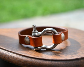 Leather tan bracelet with stainless steel shackle buckle