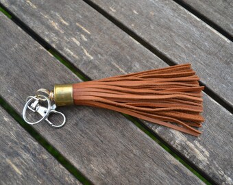 Tan oiled leather tassel keychain with real bullet casing
