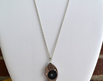 Necklace with genuine stingray, vintage pocket watch parts and swarovski crystals