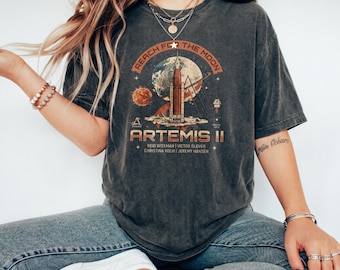 Vintage Washed  Graphic Shirt with NASA Rocket, Earth-Moon Backdrop & Crew Names, Space Exploration Tribute for Stargazing Events  Wear