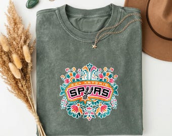 San Antonio Spurs Floral Fan Tee, Vintage Washed army Green Shirt with Spurs Logo & Colorful Folk-Art Floral Border Everyday Wear