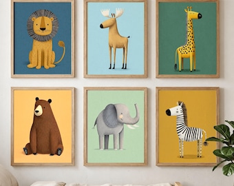 May include: Six framed animal art prints. The prints feature a lion, moose, giraffe, bear, elephant, and zebra. Each animal is depicted in a cartoon style with a solid color background. The frames are made of light brown wood.