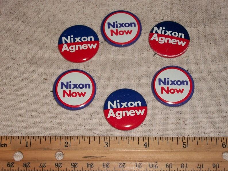 Six Vintage Policital Pins...Nixon Now and Nixon Agnew Pins...Tin Litho Pin Back Buttons...Nice Condition...Set of 6...1960/'s Political Pins