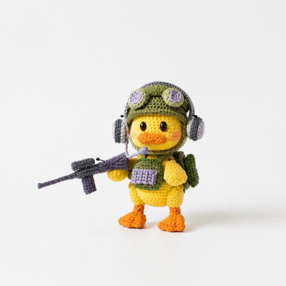 A crocheted rubber duck dressed in full military gear — the specificity of 'soldier duck' is exactly the kind of weird-cool crossover that wins white elephant exchanges.
