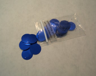May include: A bag of blue metallic round sequins. The bag has a label that reads "Sparkle Pretty" and "Royal Blue Metallic".