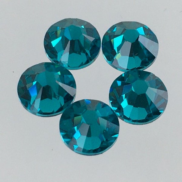 Blue Zircon Swarovski Rhinestones  Flat Back Glue On Sold by the Gross.  34ss Sold by 1/2 gross