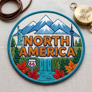 May include: Embroidered patch with a blue border and the words "NORTH AMERICA" in orange. The design includes mountains, the Statue of Liberty, a waterfall, Route 66 sign, and maple leaves.