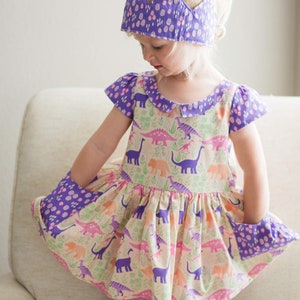 Robe de dinosaure, robe Dino girly, robe Dino pour tout-petits, robe Dino pour filles, robe Dino rose et violette, robe de fête de dinosaure, vêtements de dinosaure