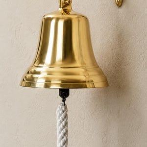 Nautical Wall Bell with Rope Pull | Polished Chrome Ship Bell | Garden Doorbell | Outdoor Wall Mounted Bell | Coastal Home Decor 6 Inch