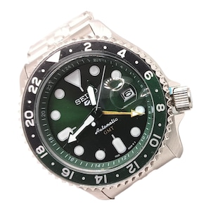 May include: A stainless steel Seiko GMT automatic watch with a green and black dial. The watch has white hands and markers, a date display, and a rotating bezel with numbers. The watch strap is also stainless steel.