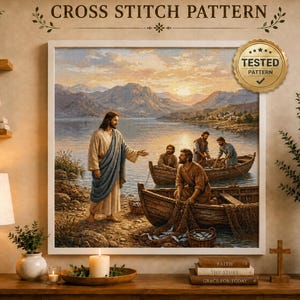 Op de afbeelding: Een kruissteekpatroon met een religieuze scène van een figuur in een blauw gewaad op een oever, wijzend naar mensen in houten boten op een meer bij zonsondergang. Bevat de tekst CROSS STITCH PATTERN en een gouden TESTED PATTERN zegel.