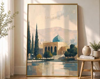 May include: A framed wall art print featuring an impressionistic painting of a building with a blue dome and tall cypress trees. The text SHIRAZ is printed in the upper centre. The colour palette includes soft beige, muted blue, and earthy brown tones.