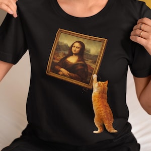 Lustiges Katzen-Knocking Over Painting Shirt, schelmisches Kitty Art T-Shirt, Museum Humor Grafik, Unisex