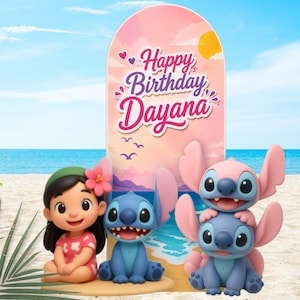 May include: A birthday party display featuring a tall arched sign with the text Happy Birthday Dayana, decorated with a sunset beach scene. In front are three figures: a girl with a pink flower in her hair and two blue alien characters.