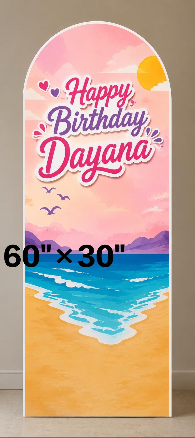 May include: An arched sign measuring 152.4 cm by 76.2 cm featuring a beach scene with a yellow sun, blue ocean waves, and sandy shore. The text Happy Birthday Dayana is printed in large white and pink letters with purple heart accents.