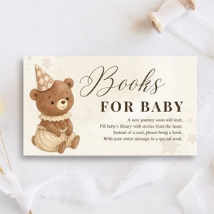 May include: A baby shower invitation card with a watercolor illustration of a teddy bear wearing a party hat and striped pants. The card reads "Books for Baby" and includes text requesting books instead of cards.