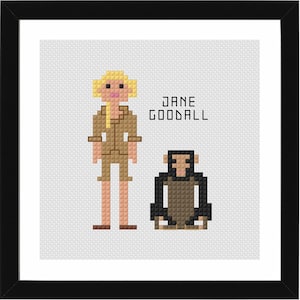 May include: A white ceramic mug with a black handle and the text "But First, Coffee" in a bold, black font. The mug is set against a blurred background, suggesting a cosy setting.