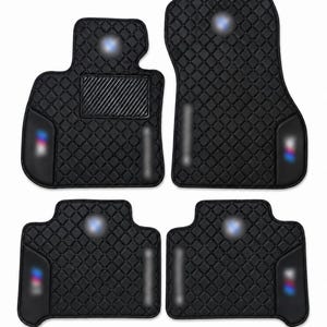 Las alfombrillas de cuero de lujo con logotipos bordados y diseños personalizados, compatibles con vehículos BMW, se fabrican bajo pedido.