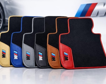 Juego de alfombrillas para coche estilo BMW M, color negro, con detalles en piel.