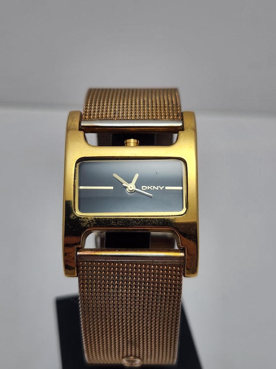 Working DKNY Women's Gold Tone Mesh Cuff Watch | Black Rectangular Dial | Designer Fashion Watch | Donna Karan New York Bracelet Watch