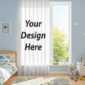 May include: White sheer curtain with the text "Your Design Here" in black. The curtain hangs in front of a window, with a view of green trees and blue sky. The room has a blue wall, a bed, and a colorful rug.