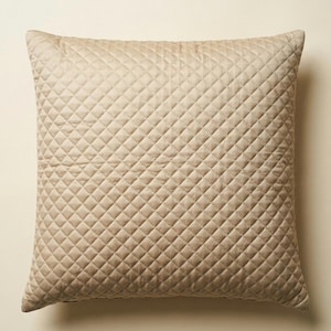 May include: A set of three ceramic mugs with a speckled, matte finish in cream, light grey, and dark grey. Each mug has a simple, modern design and a rounded handle. Ideal for tea or coffee.