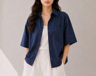 Blusa tipo camisa corta extragrande de RIVAVIVA