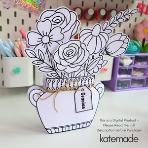 May include: A white paper craft vase filled with black and white line art flowers. The vase features a decorative border, a tied twine bow, and a small rectangular tag with the word Gracias printed on it. The text reads This is a Digital Product.