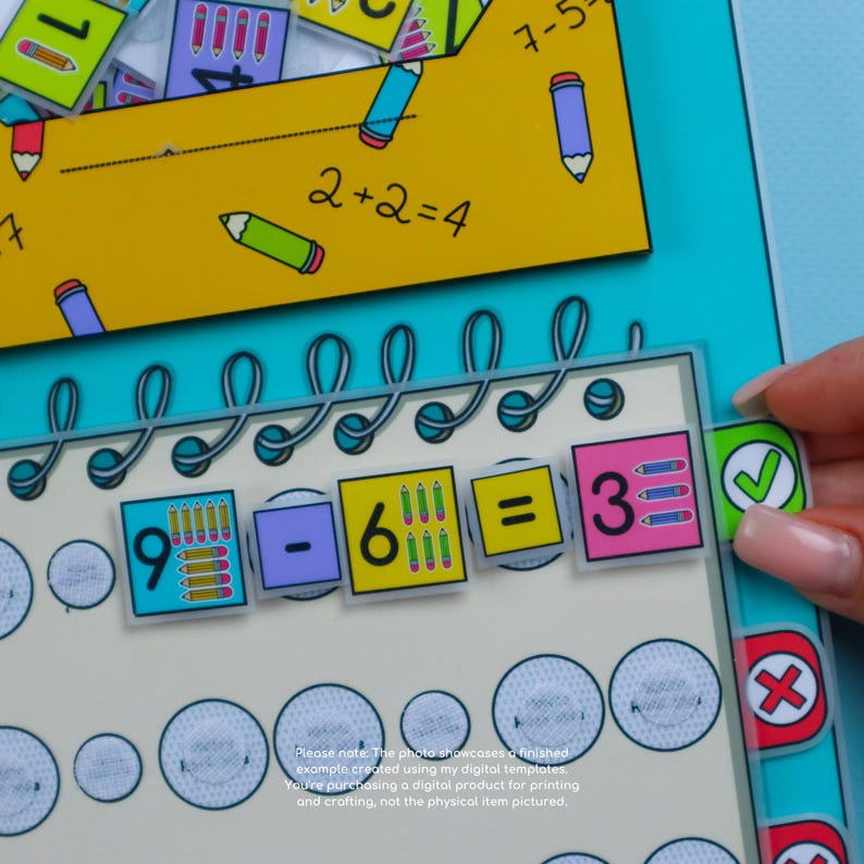 May include: A colorful educational math game with the equation 9 - 6 = 3 displayed. The game features pencil illustrations and the equation 2 + 2 = 4. A green checkmark and a red X are also visible.
