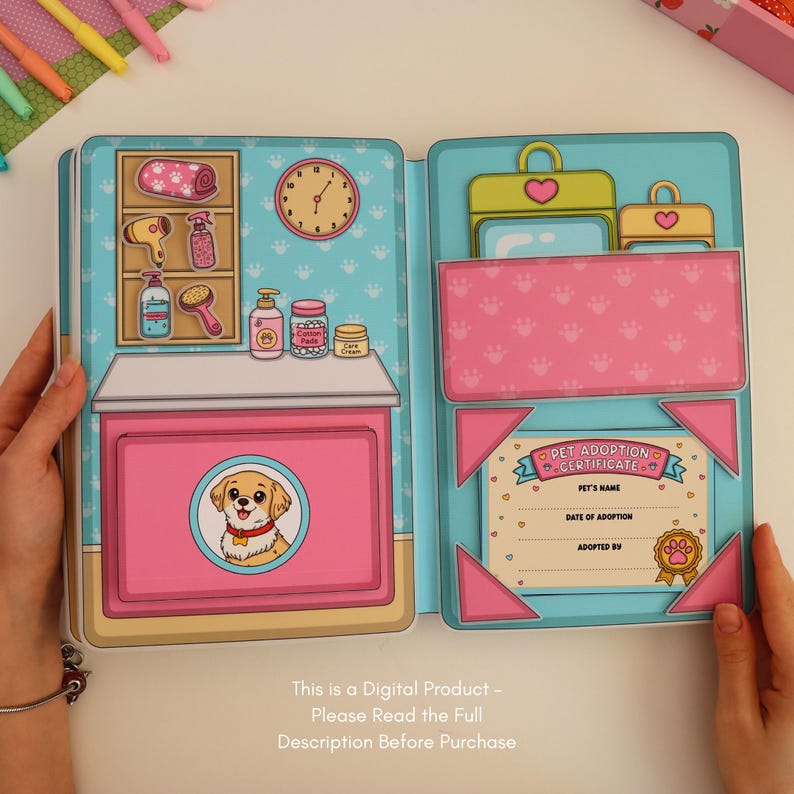 May include: Open, illustrated pet adoption kit with a pink and blue color scheme. The kit includes a grooming station, pet supplies, and a pet adoption certificate. The text reads: "This is a Digital Product - Please Read the Full Description Before Purchase."